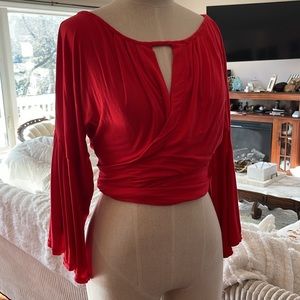 Free people flare sleeve crop. Jersey material. Size xs